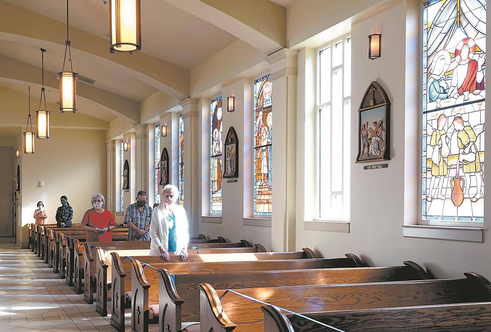 Parishioners at Mass. (Photos provided by Amy Burger.)