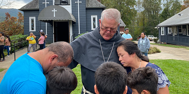 Grieving Swannanoa residents greet bishop